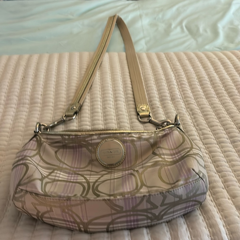 Coach crossbody gold and light lavender purse